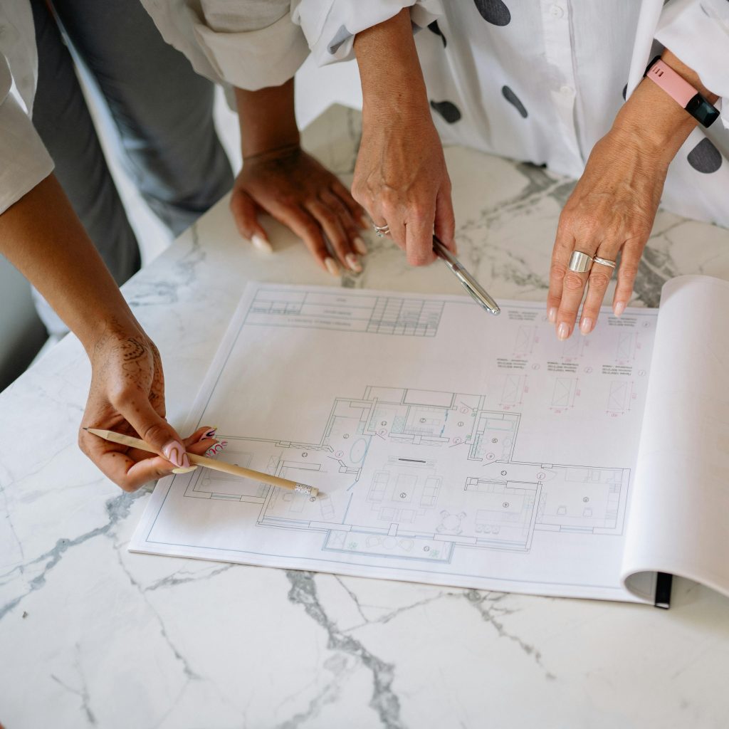 Licensed home remodeling contractor in Los Angeles reviewing renovation blueprints