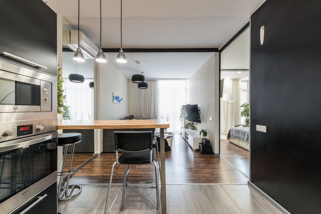 Modern ADU interior living space in Los Angeles designed by SK Home Designs & Remodeling featuring open plan kitchen and living area — SoCal ADU builder
